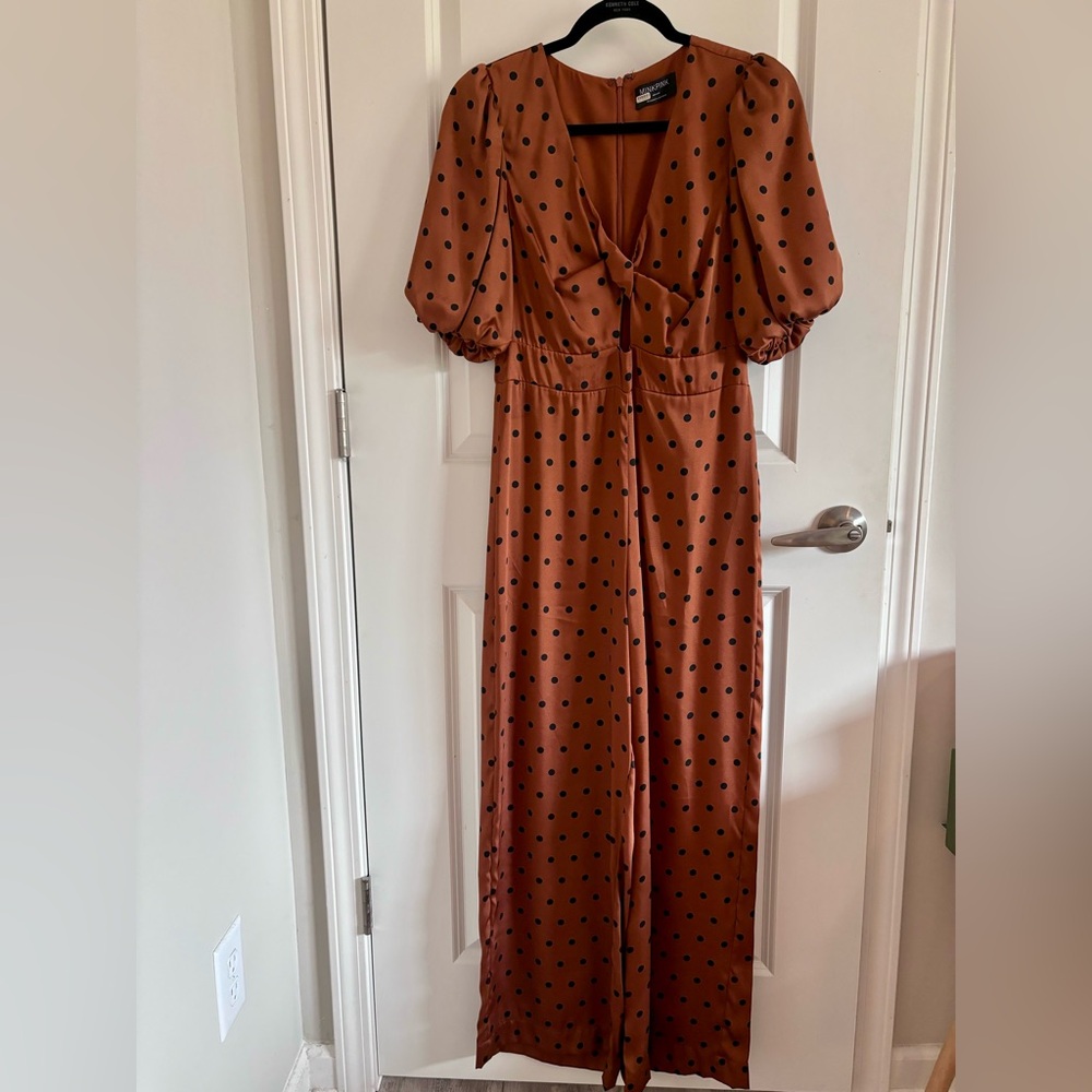 Urban outfitters silky jump suit. Back zipper. Brown with black polka dots.